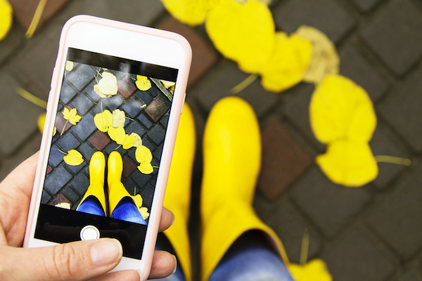 smartphone pic of yellow rain boots for local marketing using instagram