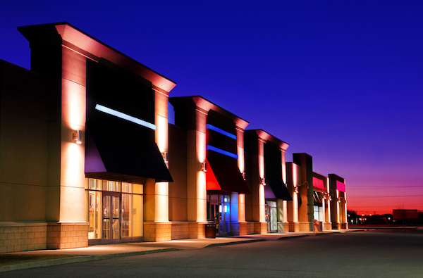 strip mall at night for small business taxes