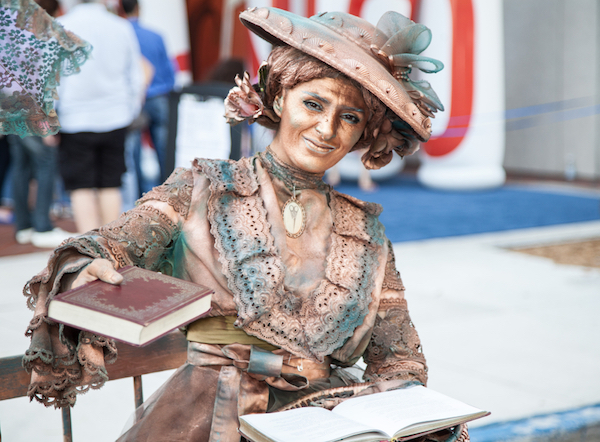 female living statue at book fair miami events