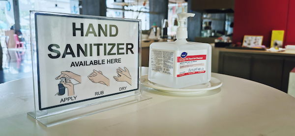 hand sanitizer station at local bar